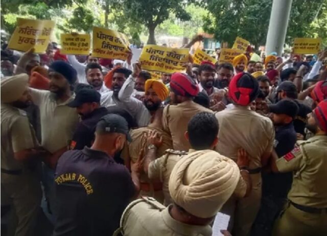 AAP workers protest outside GMADA office in Mohali against ongoing ED raid